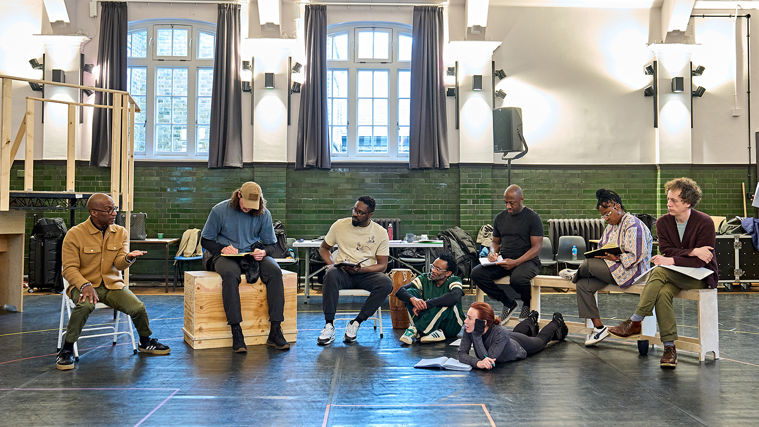 In an airy rehearsal room the company of One Flew Over the Cuckoo's Nest sit in a semi-circle in conversation. Director Clint Dyer is speaking.